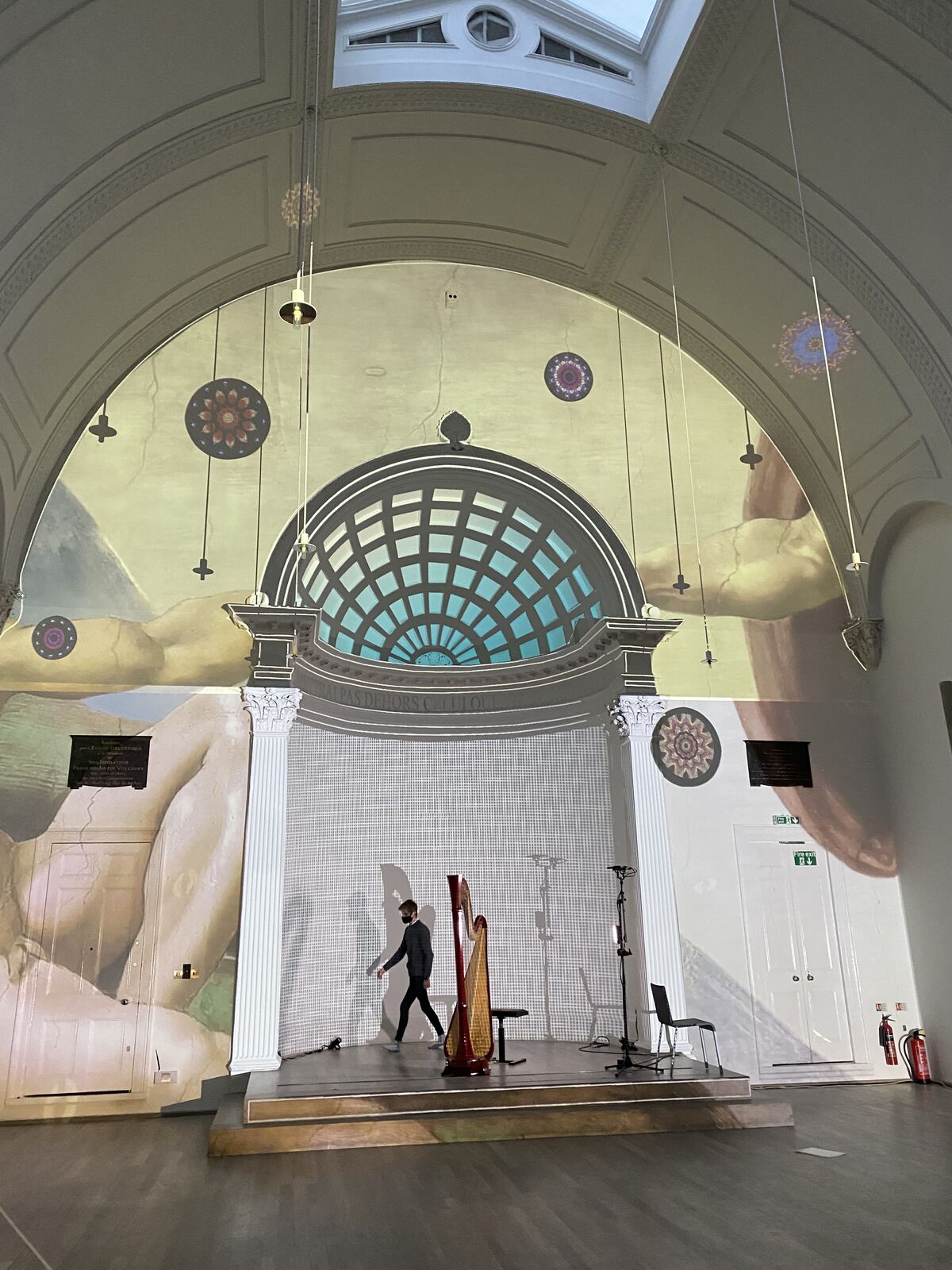 Swiss Church London — kaleidoscope rosettes projected across the nave